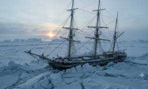 Franklin Expedition ship trapped in Arctic pack ice under a pale winter sky