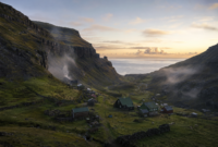 Remote settlement among mountains and wilderness representing isolated villages