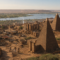 Kingdom of Kush at Meroë with steep-sided pyramids and ancient Nile city