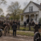 Villisca axe murders investigation outside the Moore home in Iowa in 1912, AI-generated historical reconstruction
